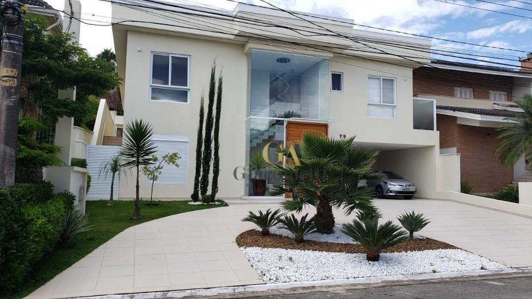 Casa de Condomínio à venda com 4 quartos, 360m² - Foto 1