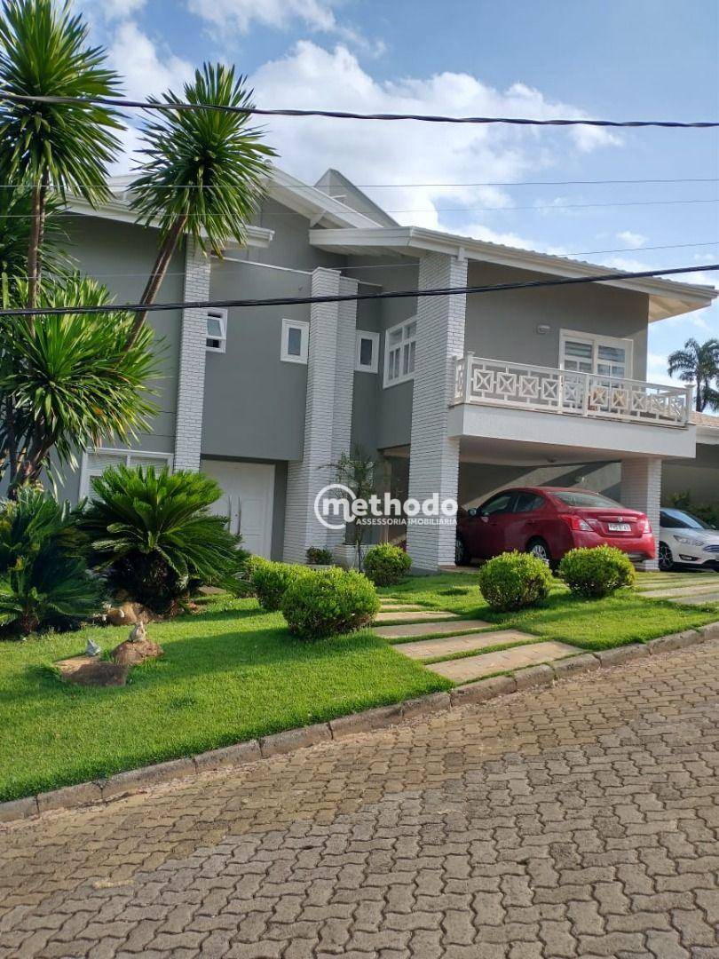 Casa de Condomínio à venda com 4 quartos, 562m² - Foto 1