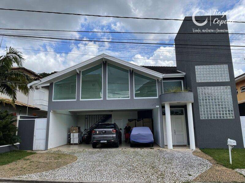 Casa de Condomínio à venda e aluguel com 3 quartos, 580m² - Foto 1