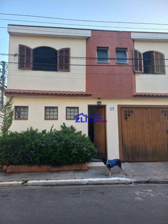 Sobrado à venda com 4 quartos, 296m² - Foto 1