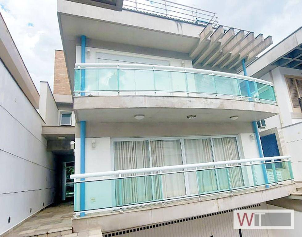 Casa à venda com 4 quartos, 304m² - Foto 1