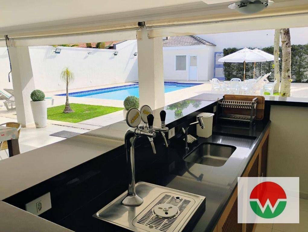 Casa de Condomínio à venda e aluguel com 4 quartos, 550m² - Foto 30