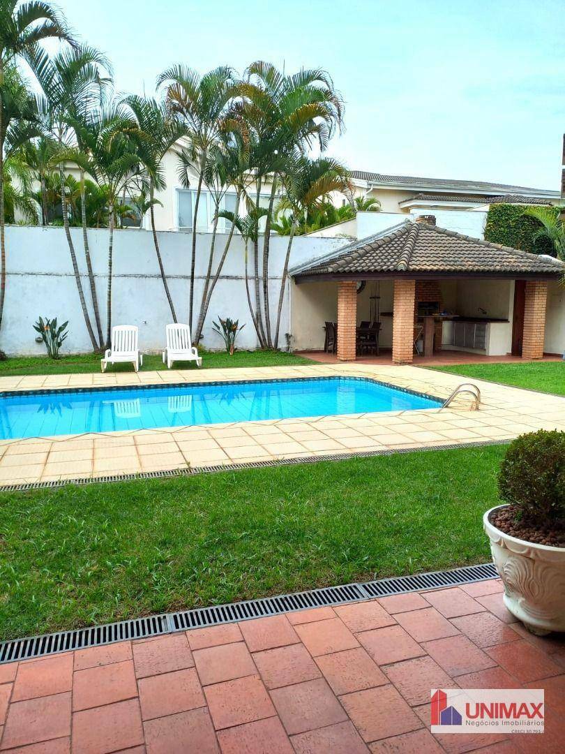 Casa de Condomínio à venda com 4 quartos, 380m² - Foto 1