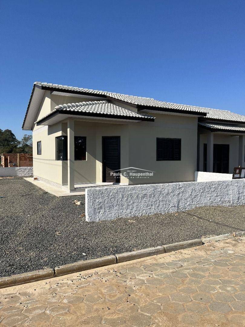 Casa à venda com 3 quartos, 58m² - Foto 1