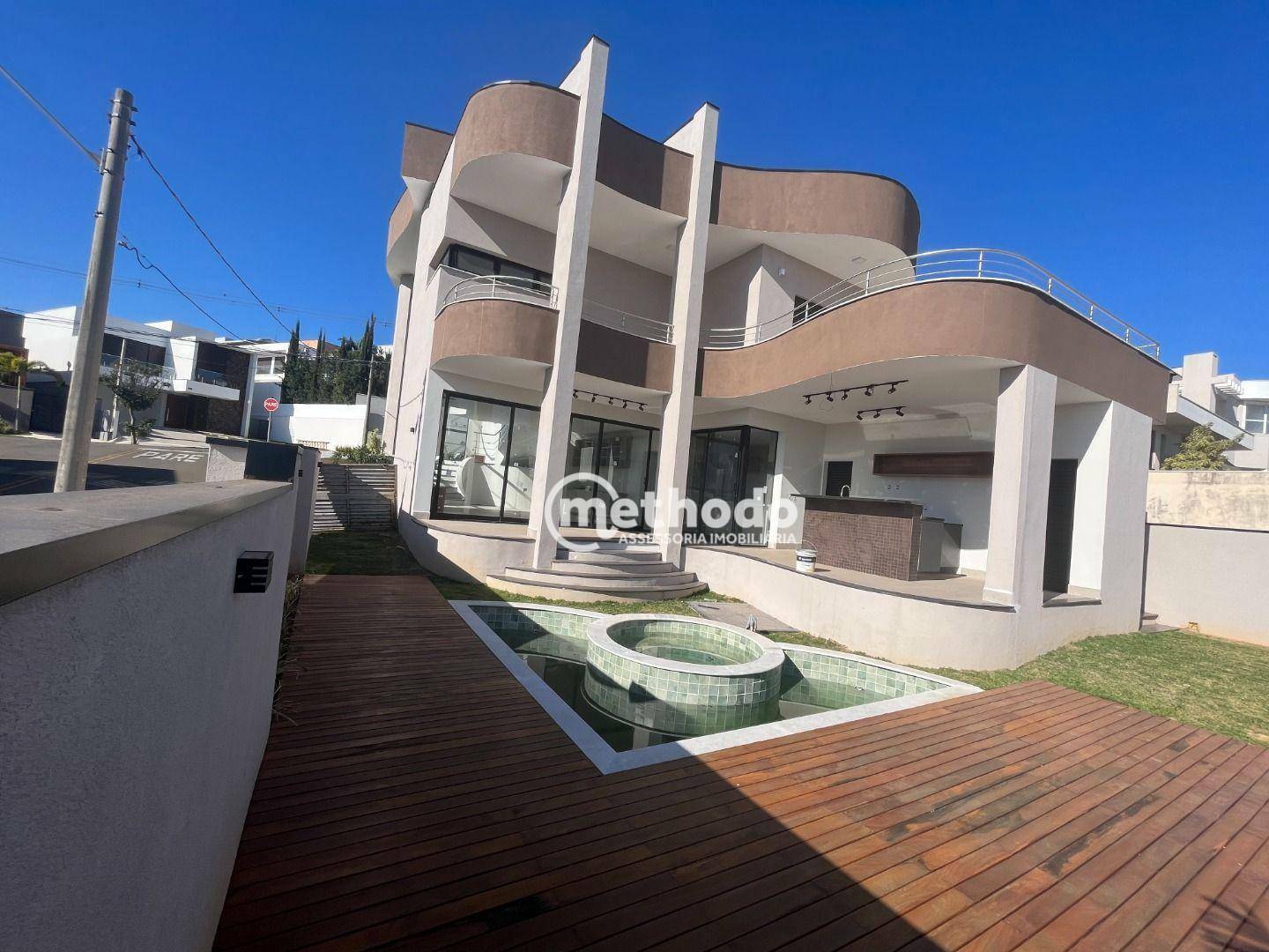 Casa de Condomínio à venda com 4 quartos, 302m² - Foto 1