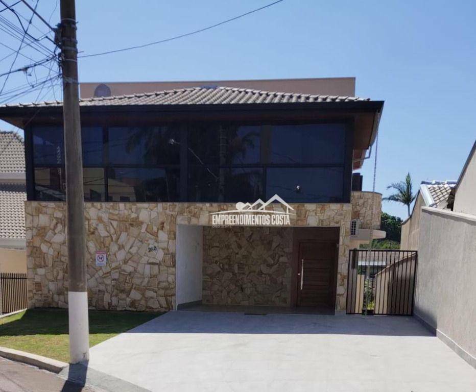 Casa de Condomínio à venda com 5 quartos, 460m² - Foto 1