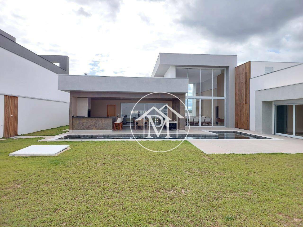 Casa de Condomínio à venda e aluguel com 4 quartos, 394m² - Foto 1