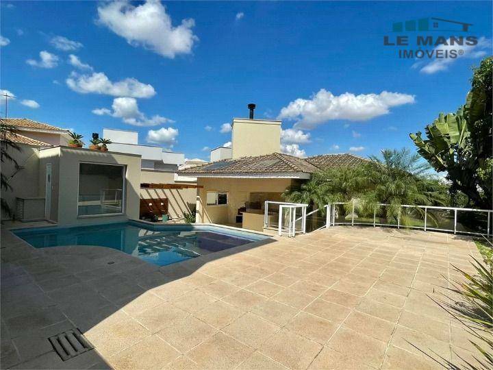 Casa de Condomínio à venda e aluguel com 4 quartos, 390m² - Foto 1