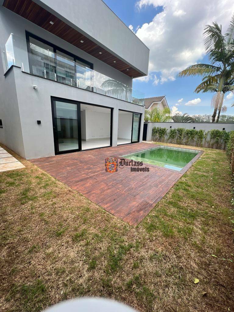 Casa de Condomínio à venda com 4 quartos, 400m² - Foto 1