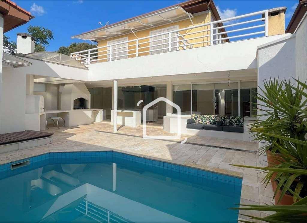 Casa de Condomínio à venda com 4 quartos, 360m² - Foto 1