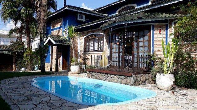 Casa de Condomínio à venda com 3 quartos, 540m² - Foto 1