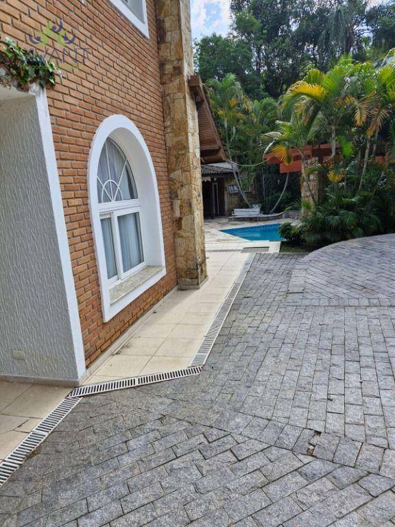 Casa de Condomínio à venda e aluguel com 4 quartos, 550m² - Foto 15