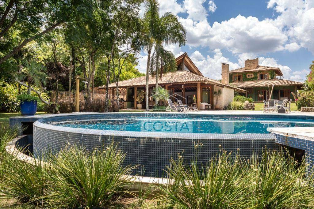 Casa de Condomínio à venda e aluguel com 5 quartos, 710m² - Foto 1