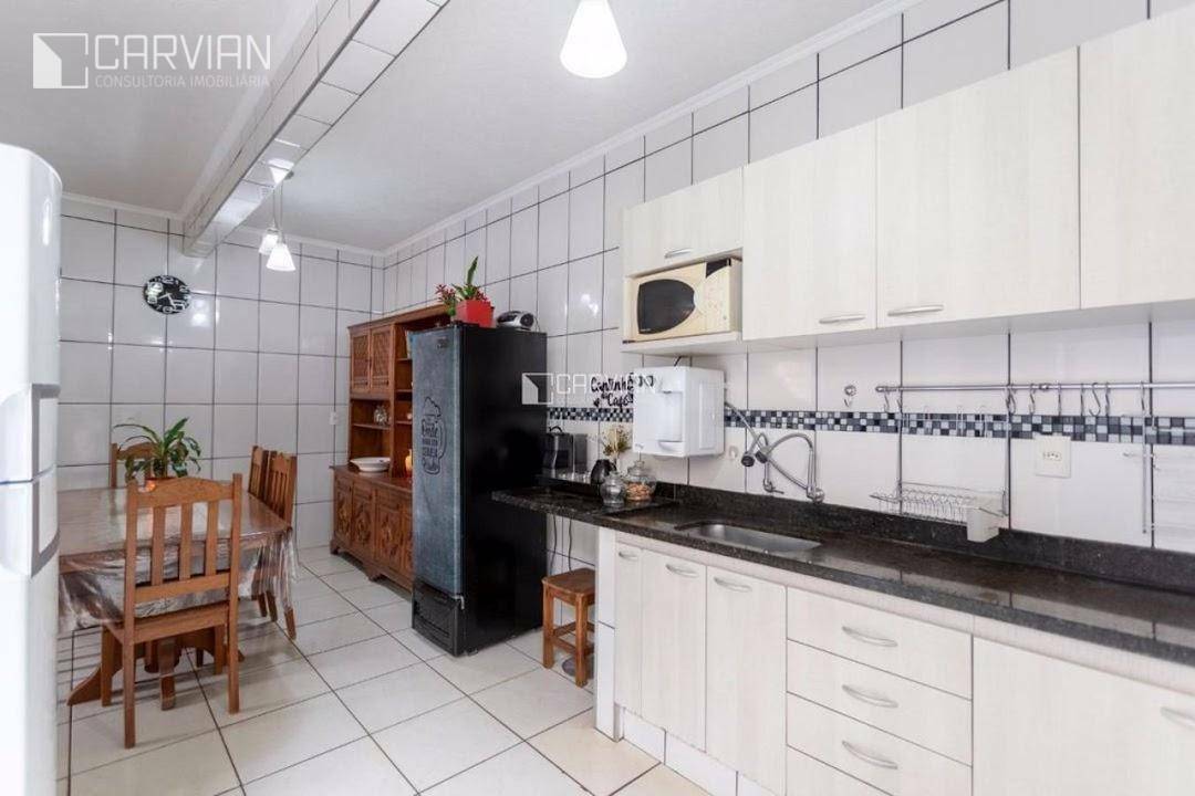 Casa à venda com 4 quartos, 155m² - Foto 14