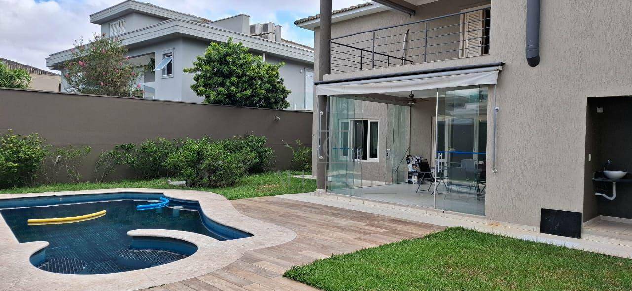 Casa de Condomínio para alugar com 4 quartos, 627m² - Foto 2