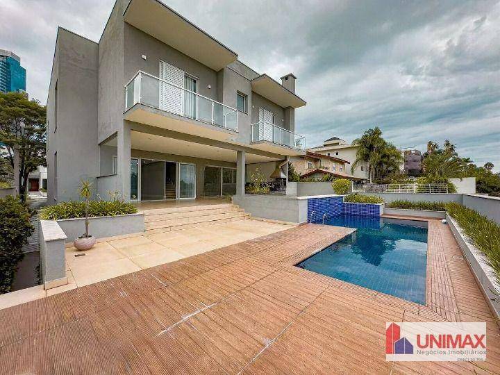 Casa de Condomínio à venda com 4 quartos, 412m² - Foto 2