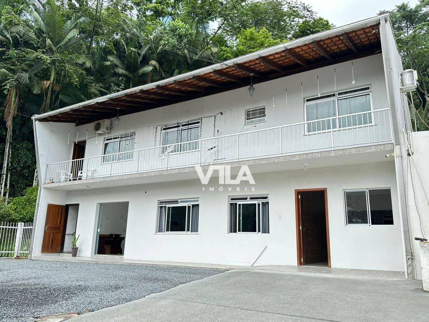 Casa à venda com 4 quartos, 313m² - Foto 1