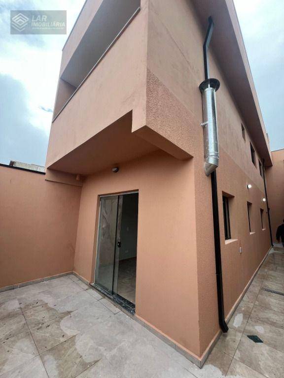 Casa à venda com 3 quartos, 126m² - Foto 1