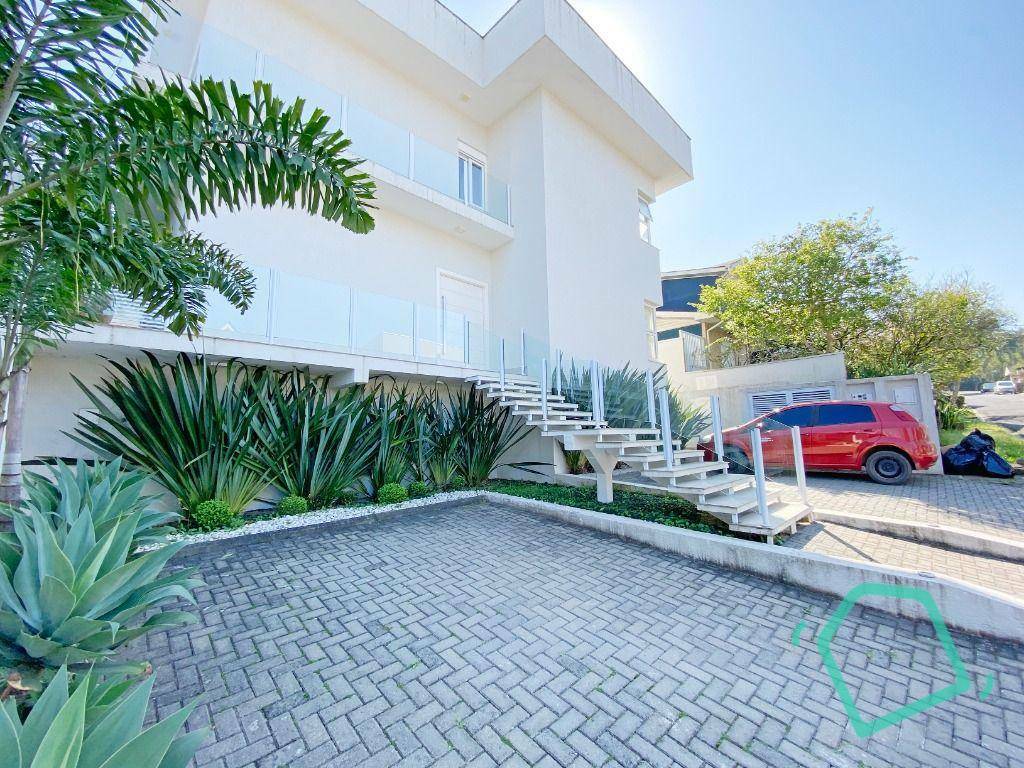 Casa de Condomínio à venda com 4 quartos, 377m² - Foto 1