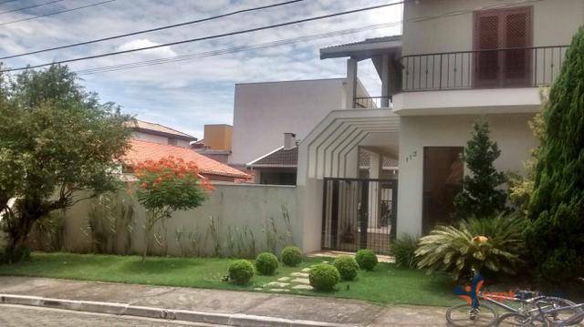 Casa de Condomínio à venda com 4 quartos, 357m² - Foto 3