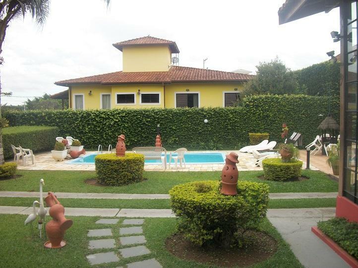 Casa de Condomínio à venda com 4 quartos, 398m² - Foto 1