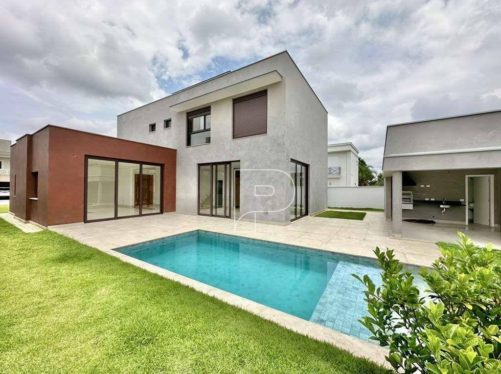 Casa de Condomínio à venda e aluguel com 4 quartos, 350m² - Foto 1