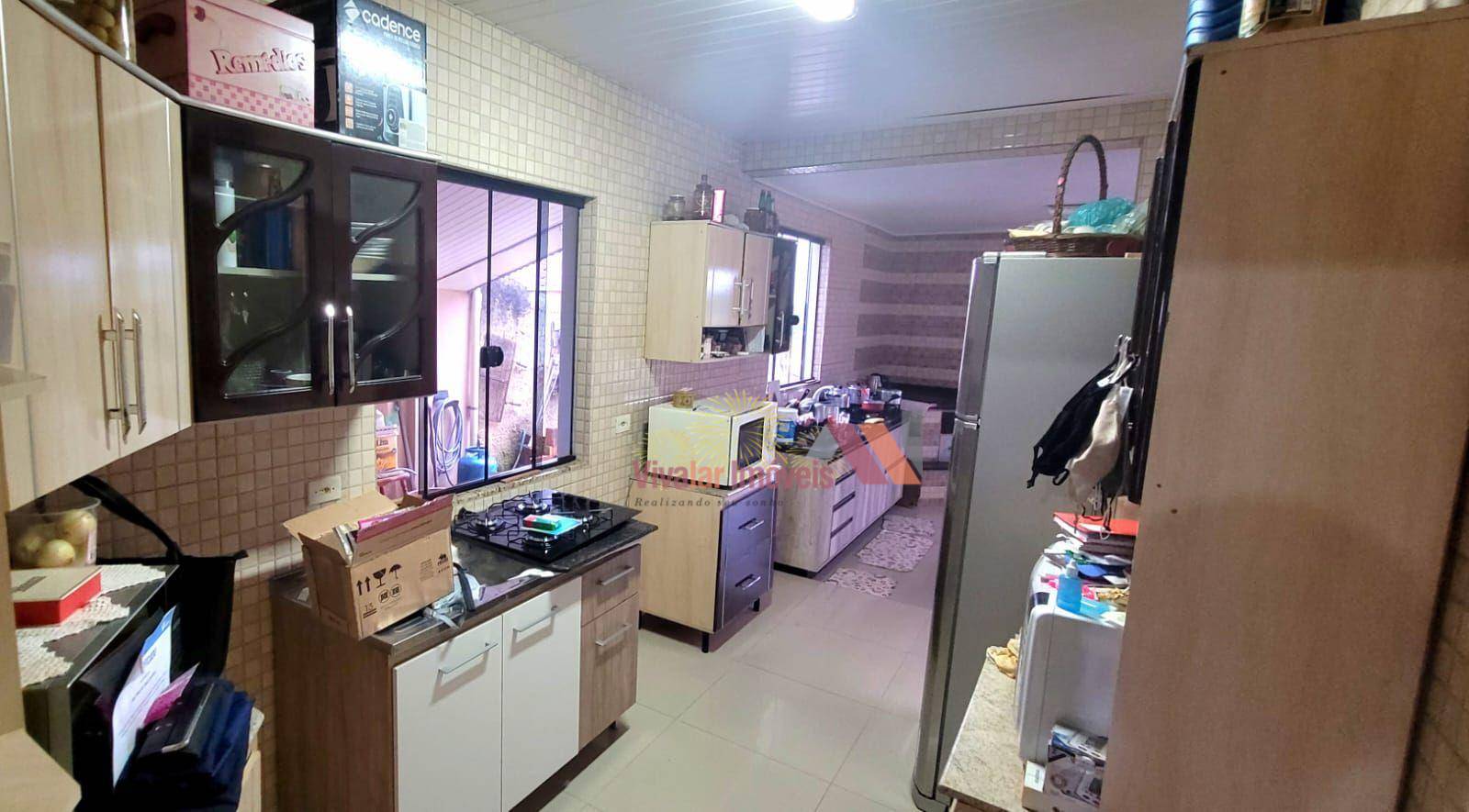 Casa à venda com 3 quartos, 100m² - Foto 4