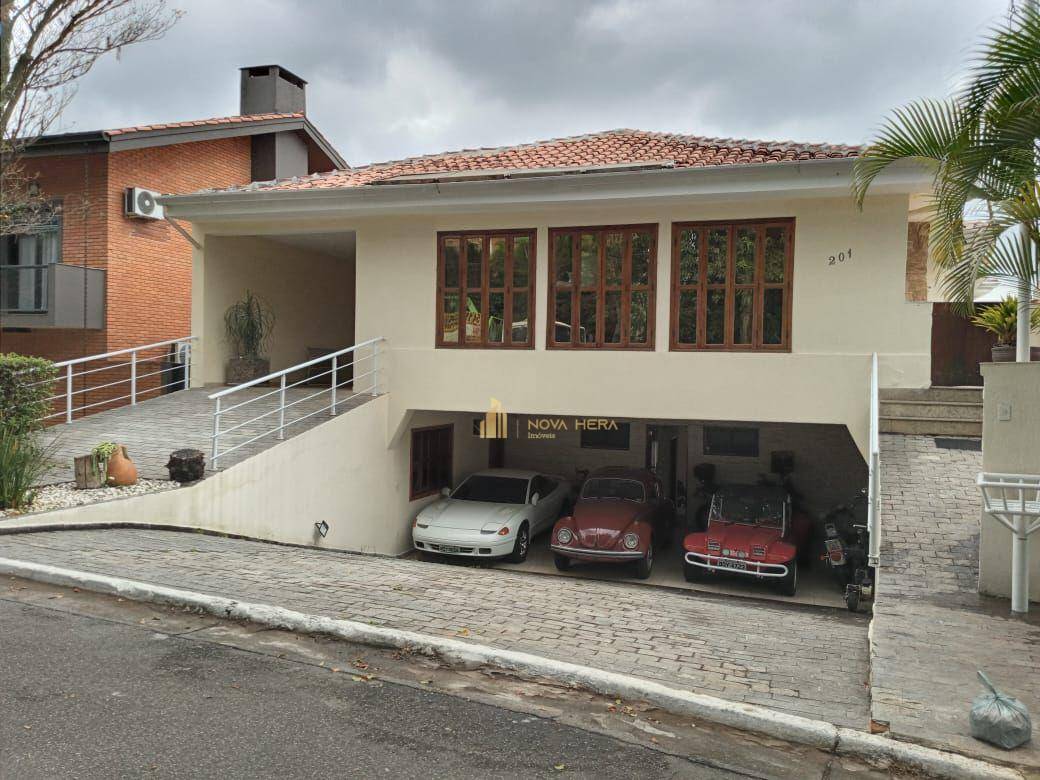 Casa de Condomínio à venda e aluguel com 4 quartos, 430m² - Foto 1