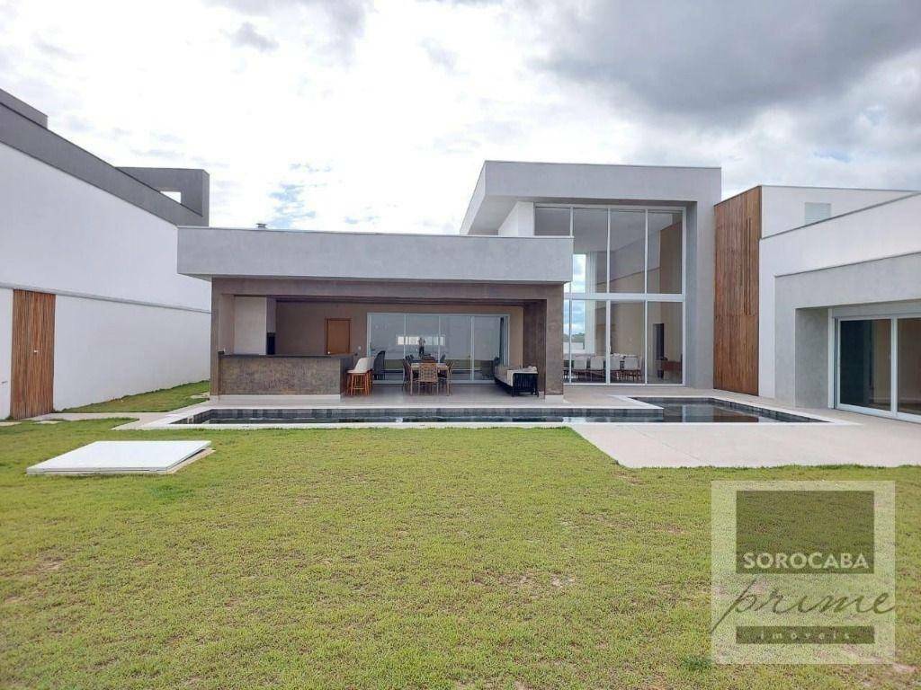 Casa de Condomínio à venda e aluguel com 4 quartos, 394m² - Foto 2