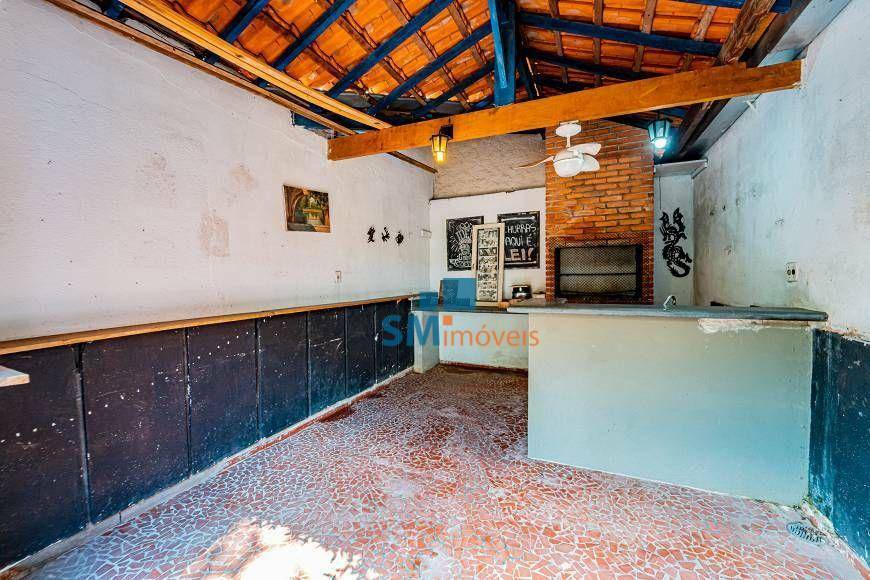 Casa à venda com 4 quartos, 270m² - Foto 11