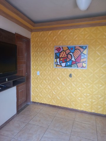 Casa à venda com 3 quartos, 100m² - Foto 1