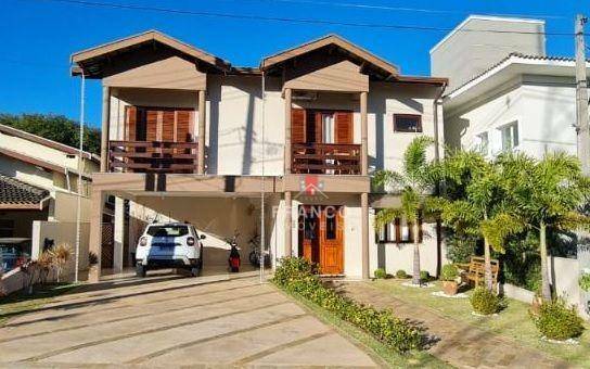 Casa de Condomínio à venda com 4 quartos, 357m² - Foto 1