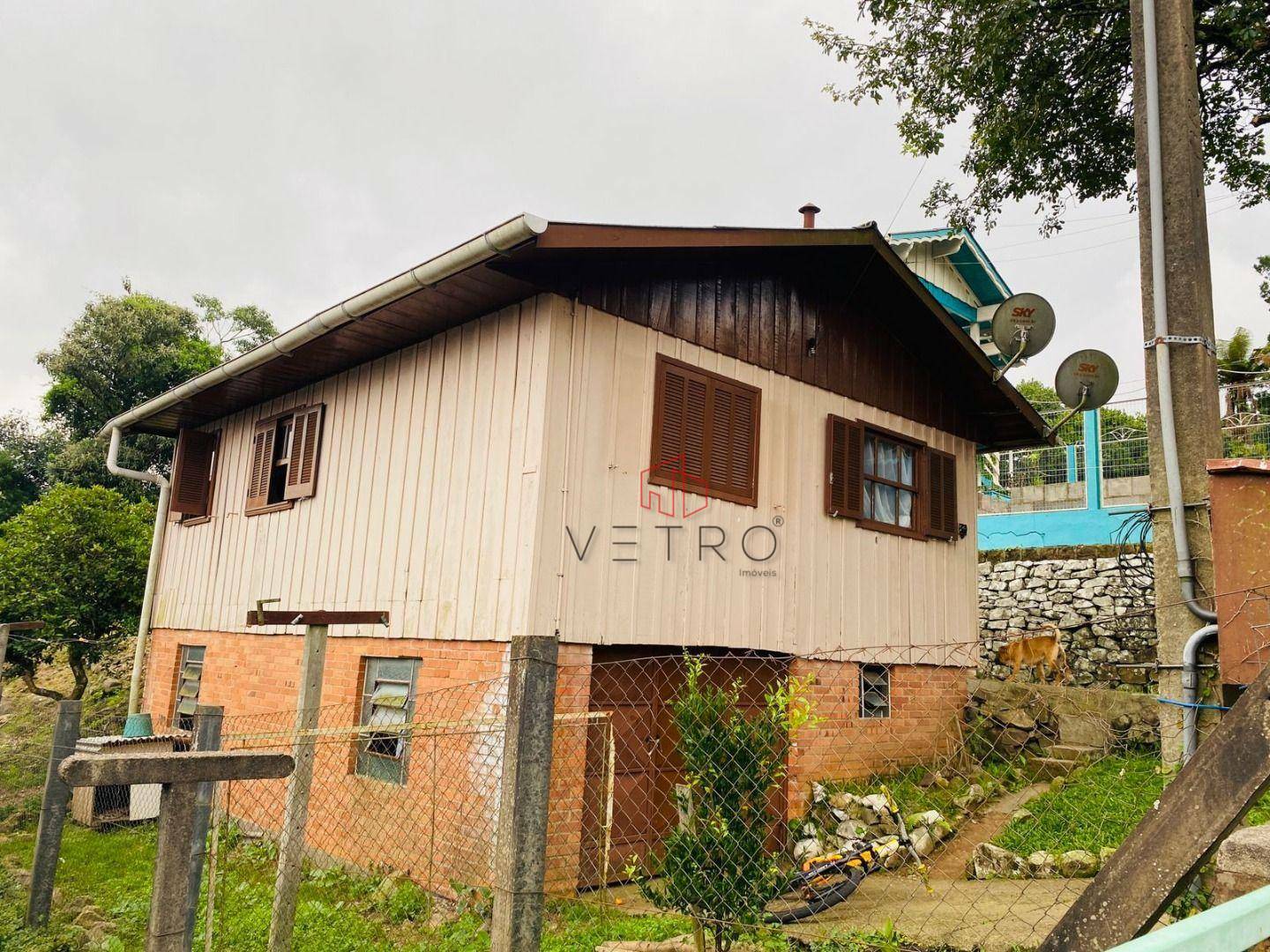 Casa à venda com 3 quartos, 48m² - Foto 1