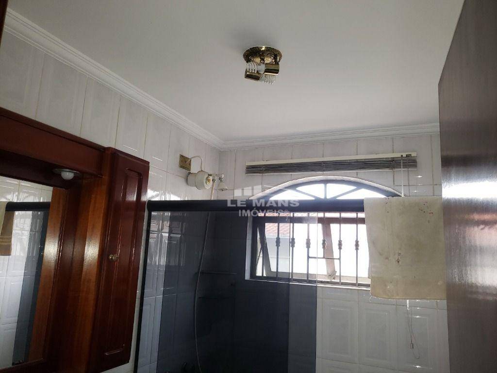 Casa à venda com 4 quartos, 244m² - Foto 7