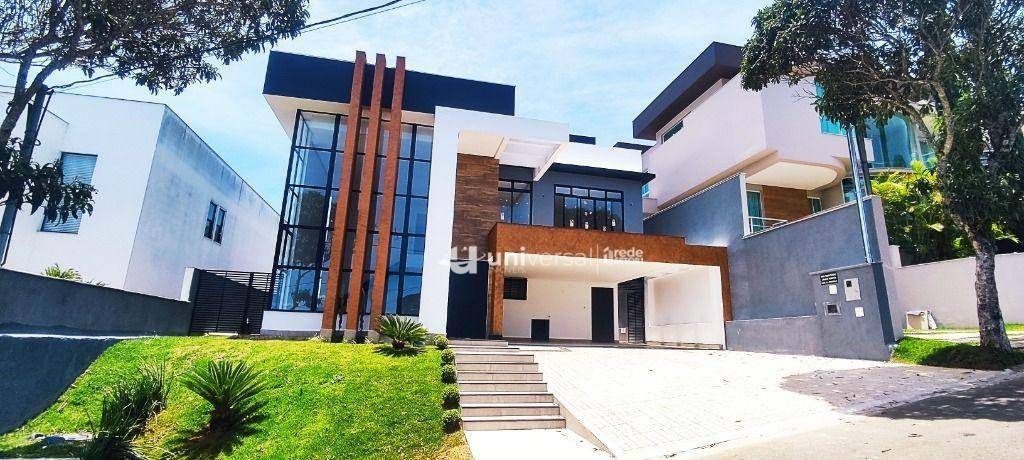 Casa de Condomínio à venda com 4 quartos, 328m² - Foto 1