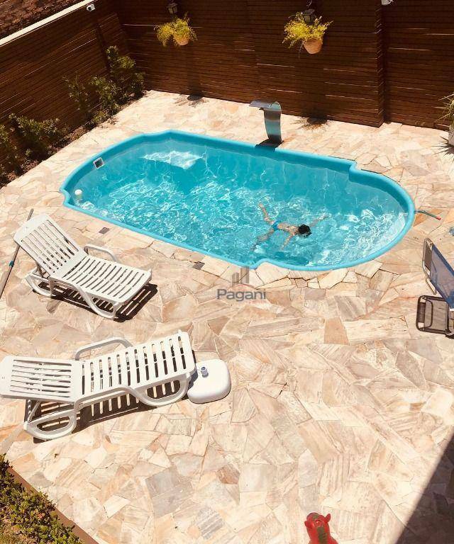Casa à venda e aluguel com 3 quartos, 281m² - Foto 1