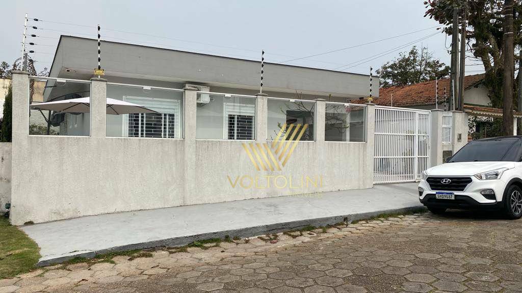 Casa à venda com 4 quartos, 126m² - Foto 1