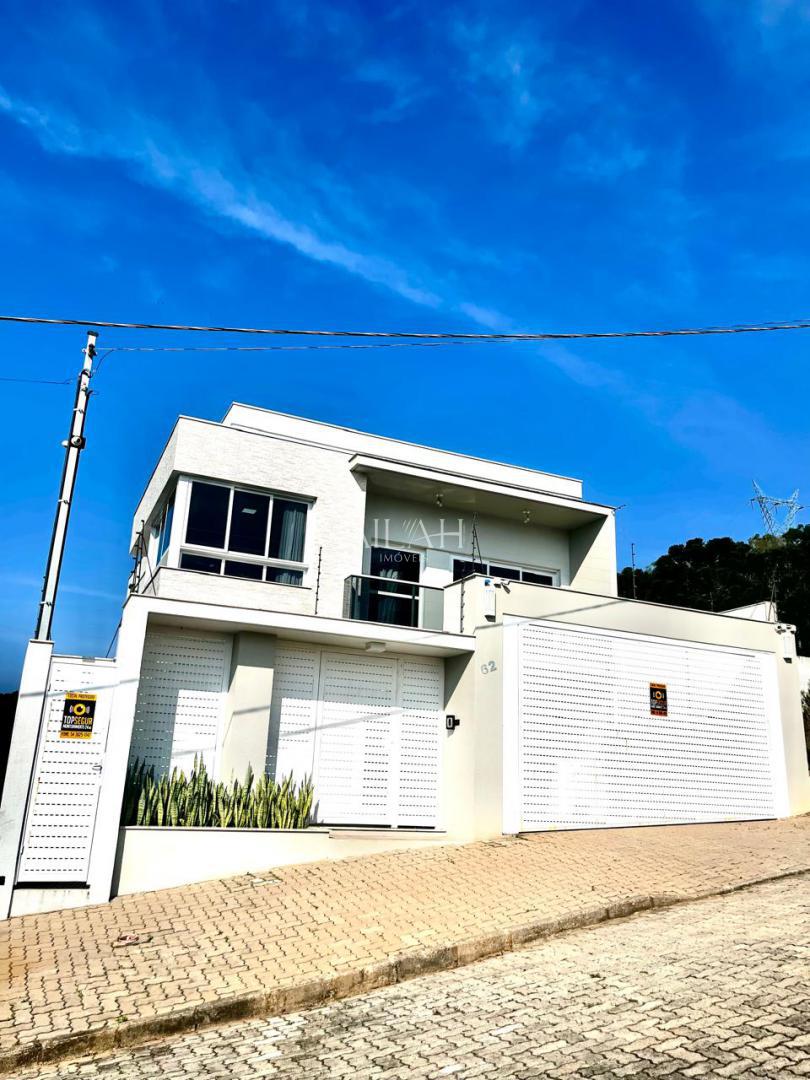 Casa à venda com 3 quartos, 294m² - Foto 1