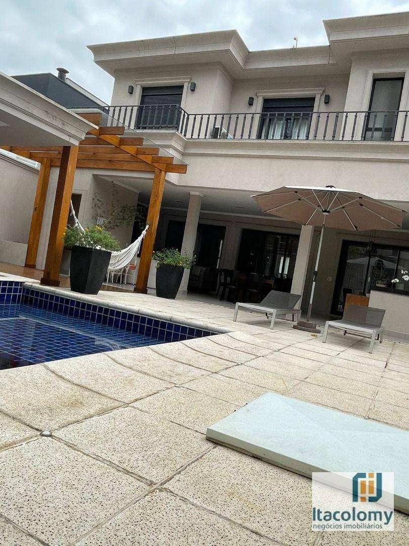 Casa de Condomínio à venda com 4 quartos, 450m² - Foto 1