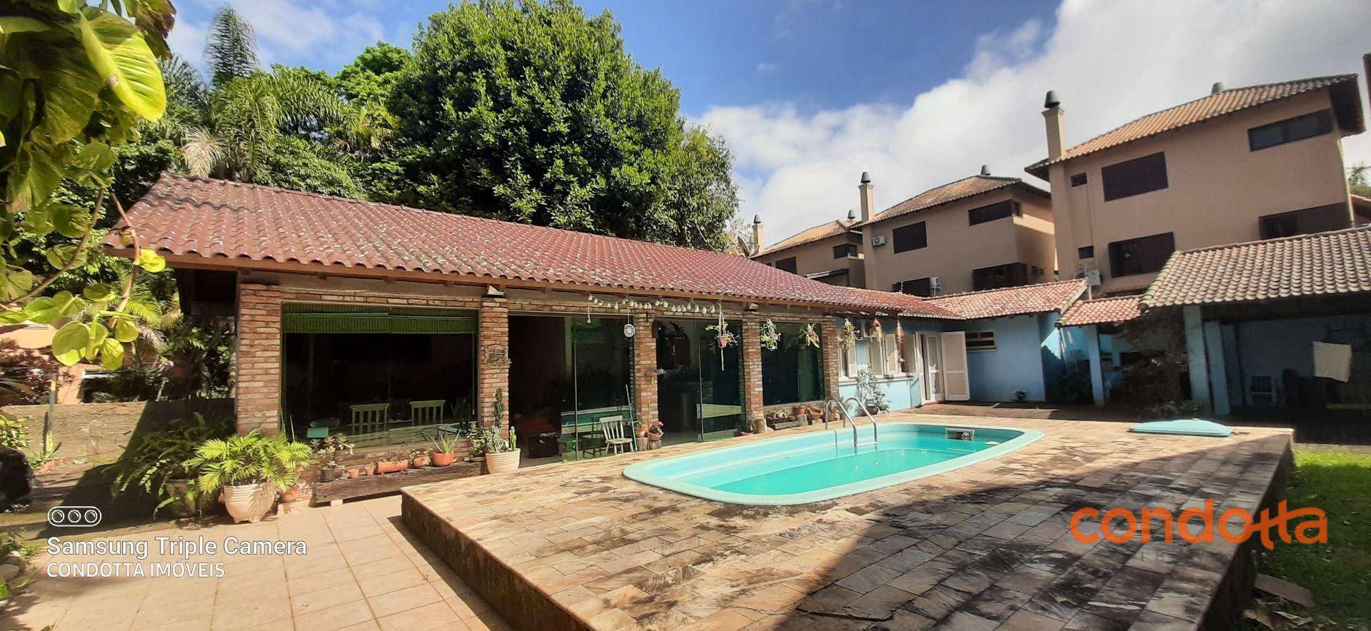 Casa para alugar com 4 quartos, 292m² - Foto 1