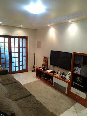 Casa à venda com 4 quartos, 154m² - Foto 1