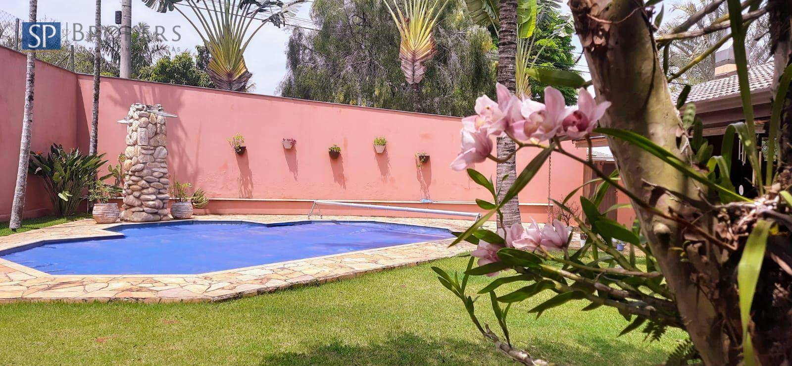 Casa de Condomínio à venda e aluguel com 4 quartos, 344m² - Foto 1