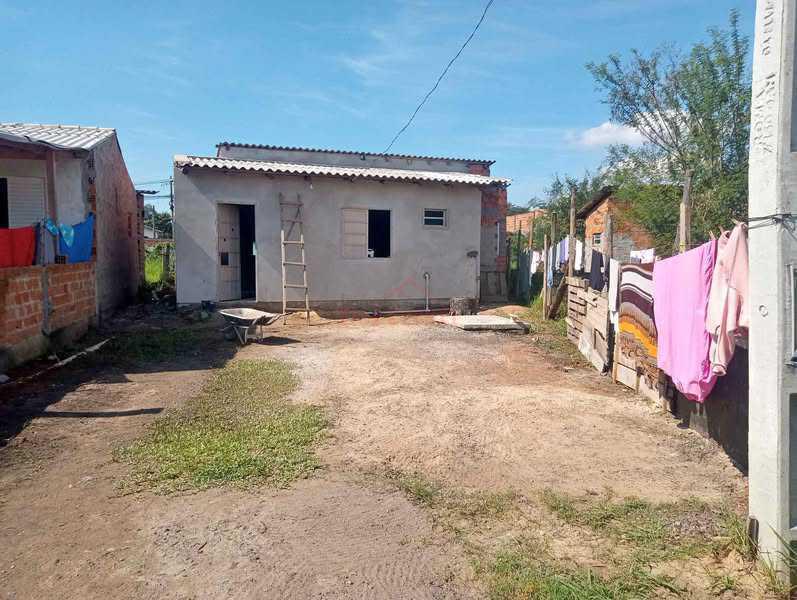 Casa à venda com 3 quartos, 118m² - Foto 1