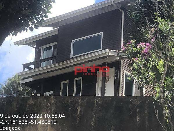 Casa à venda com 3 quartos, 88m² - Foto 1