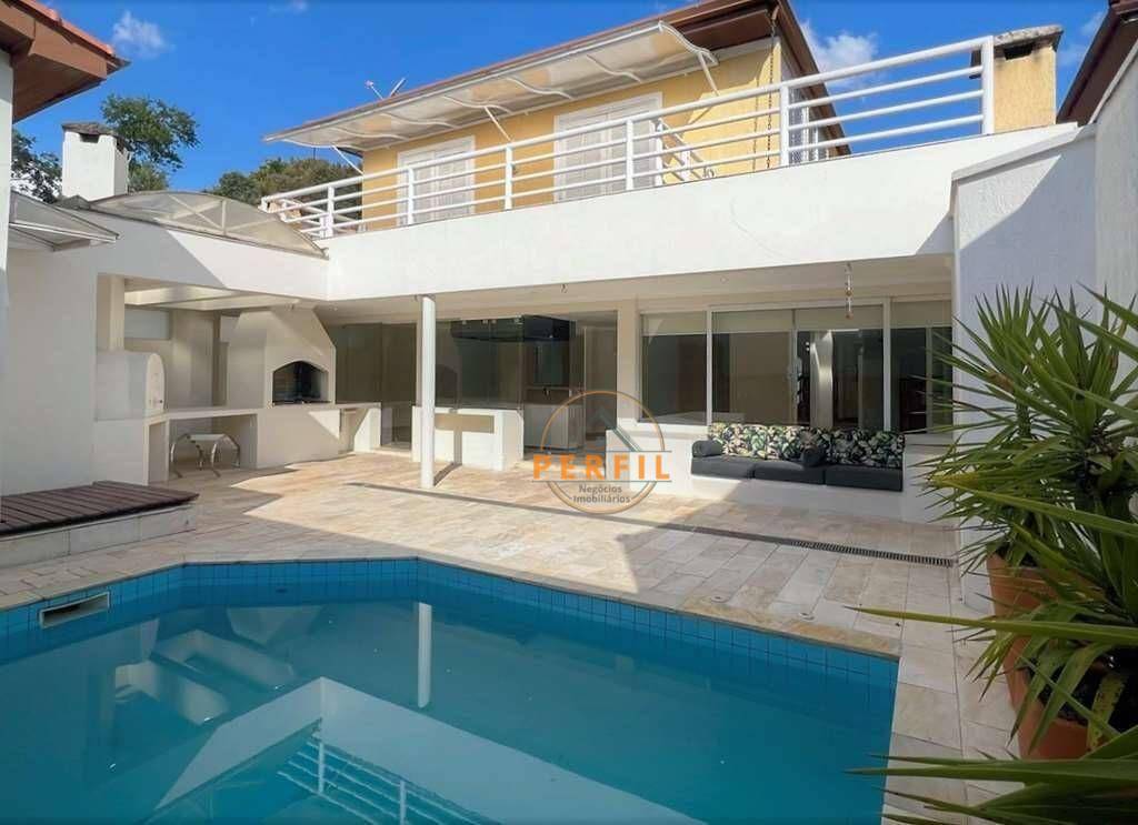 Casa de Condomínio à venda com 4 quartos, 345m² - Foto 1