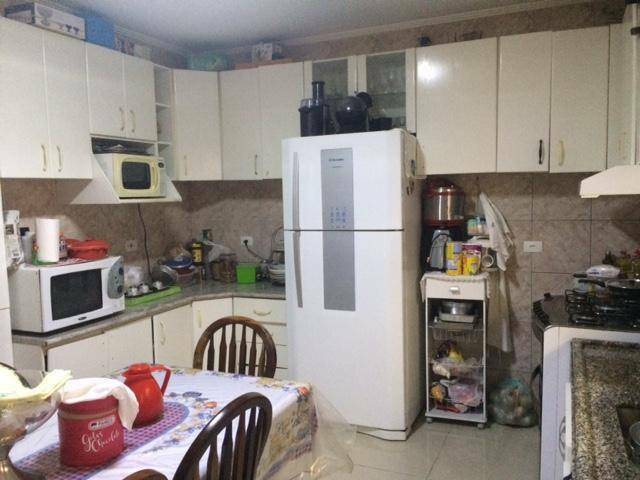 Sobrado à venda com 4 quartos, 250m² - Foto 1